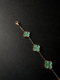 Pulsera VCA Dorada con Tréboles Verdes con franjas negras