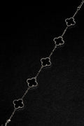 Pulsera VCA Plateada con Tréboles Negros.